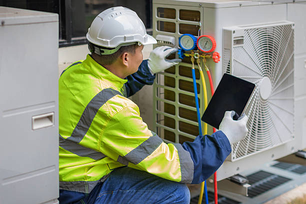 Professional Hvac Maintenance technician working in Newtonville, MA